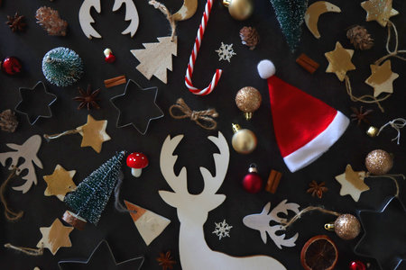 Various Christmas decorations in neutral colors on dark background. Top view.の写真素材