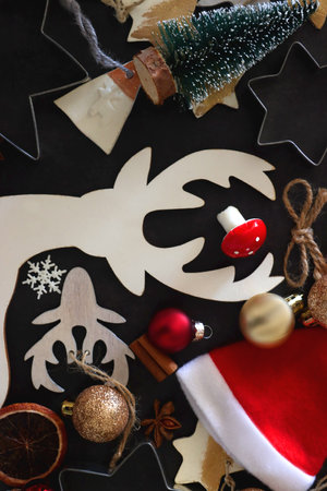 Various Christmas decorations in neutral colors on dark background. Top view.Various Christmas decorations in neutral colors on dark background. Top view.の写真素材