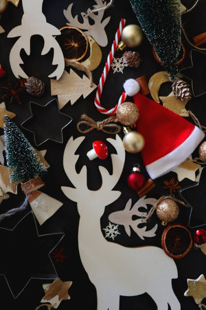 Various Christmas decorations in neutral colors on dark background. Top view.の写真素材