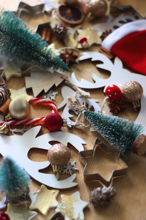 Various Christmas decorations in neutral colors on wooden background. Selective focus.の写真素材