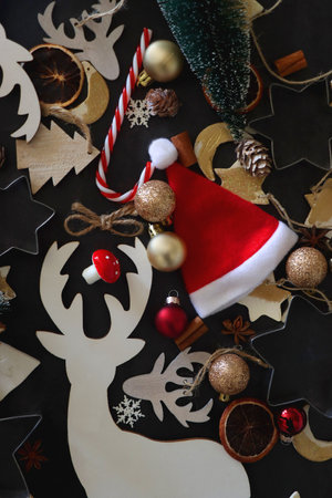 Various Christmas decorations in neutral colors on dark background. Top view.の写真素材