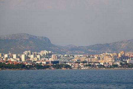 Contemporary buildings, gardens and beaches at the waterfront in Split, Croatia. View of Split from the boat.の写真素材