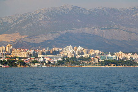 Contemporary buildings, gardens and beaches at the waterfront in Split, Croatia. View of Split from the boat.の写真素材