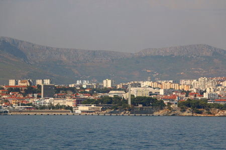 Contemporary buildings, gardens and beaches at the waterfront in Split, Croatia. View of Split from the boat.の写真素材