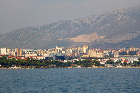 Contemporary buildings, gardens and beaches at the waterfront in Split, Croatia. View of Split from the boat.の写真素材