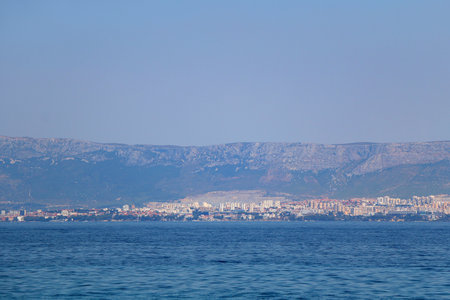Contemporary buildings, gardens and beaches at the waterfront in Split, Croatia. View of Split from the boat.の写真素材