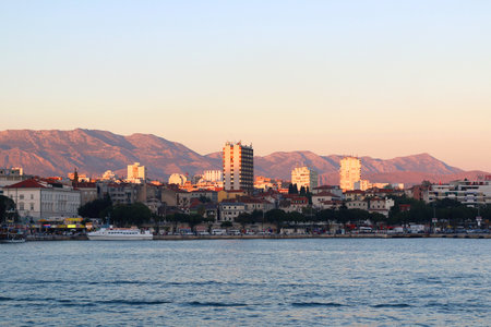 Contemporary buildings, gardens and beaches at the waterfront in Split, Croatia. View of Split from the boat.の写真素材