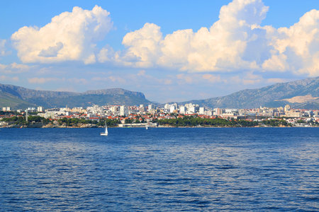 Contemporary buildings, gardens and beaches at the waterfront in Split, Croatia. View of Split from the boat.の写真素材