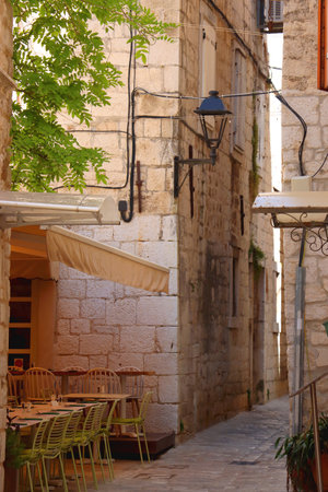 Picturesque Mediterranean street and traditional architectural details in Trogir, Croatia.の写真素材