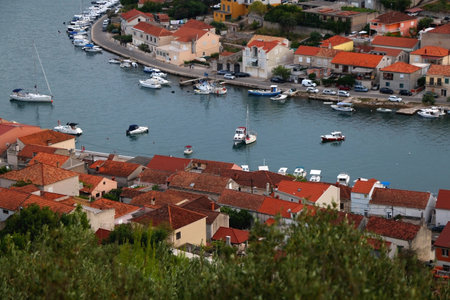 Aerial view of Vela Luka, small town on island Korcula in Croatia. Summer evening in Vela Luka.