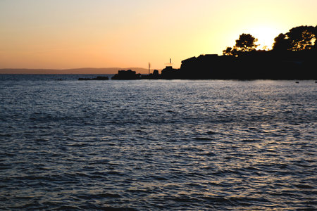 Beautiful sunset on the Bacvice beach in Split, Croatia.の写真素材