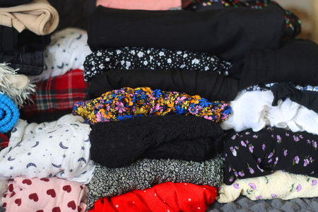 Folded clothes during closet cleanout.の写真素材