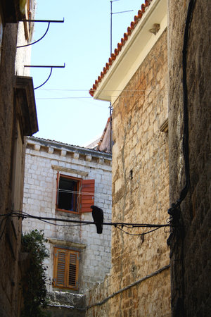 Picturesque Mediterranean street and traditional architectural details in Trogir, Croatia.の写真素材