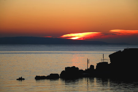 Beautiful sunset on the Bacvice beach in Split, Croatia.の写真素材