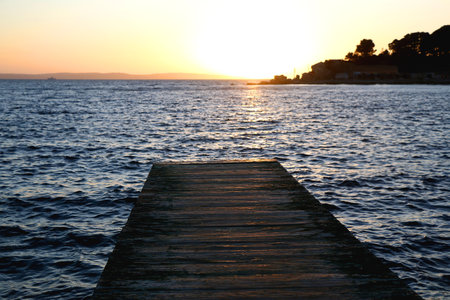 Beautiful sunset on the Bacvice beach in Split, Croatia.の写真素材
