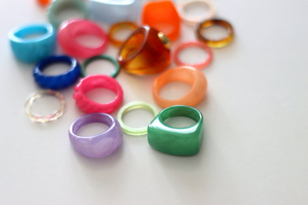 Collection of colorful plastic rings on white background. Selective focus.の写真素材