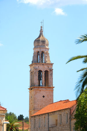 Bell tower and church of Saint Jospeh in Vela Luka, on island Korcula, Croatia.の写真素材