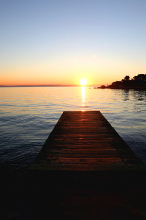 Beautiful sunset on the Bacvice beach in Split, Croatia.の写真素材
