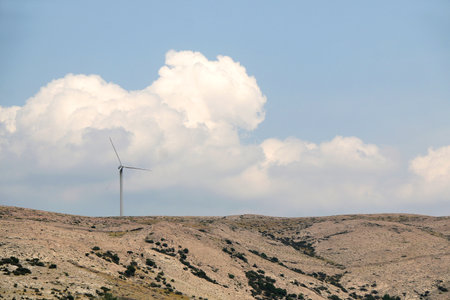 Wind turbine on the hill on island Pag, Croatia.