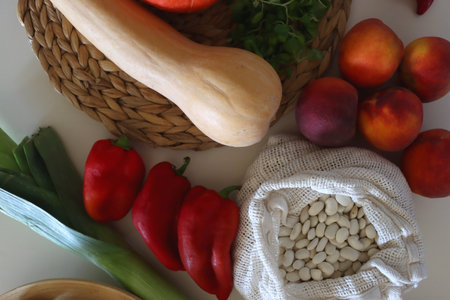 Collection of healthy fruits, vegetables and legumes on white background. Top view.