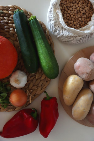 Collection of healthy fruits, vegetables and legumes on white background. Top view.の写真素材