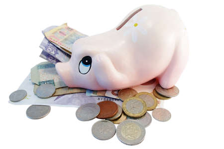 isolated Piggy bank money box with different currency money
