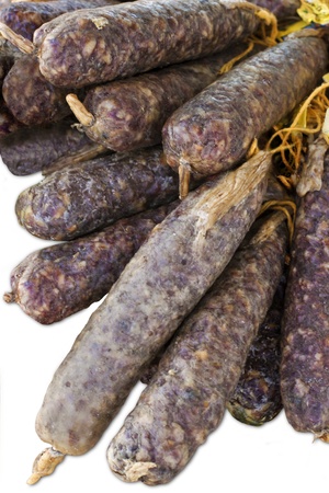 Different kinds of home-made sausages displayed on market stallの写真素材