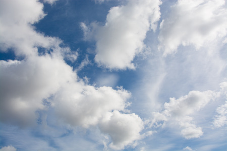 Blue sky with white clouds backgroundの写真素材
