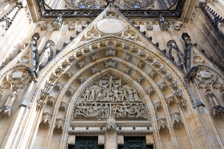 The Cathedral of Saint Vitus (1344) in Prague, Czech Republic, front portal arch architectural detailの写真素材