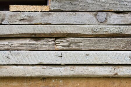 Pile of grungy old wood planks