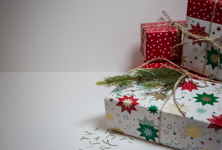 Gift boxes and fir tree isolated on white background. Copy space for text. Christmas and New Year holidays backgroundの写真素材