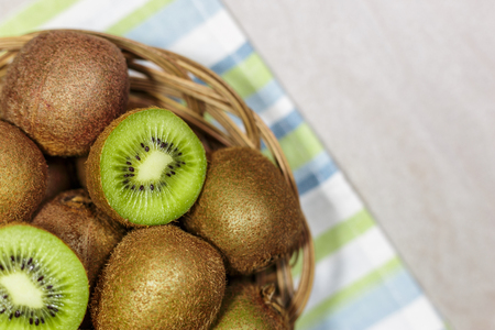 Top view of ripe kiwi fruits in a basket. Healthy nutrition concept.の写真素材