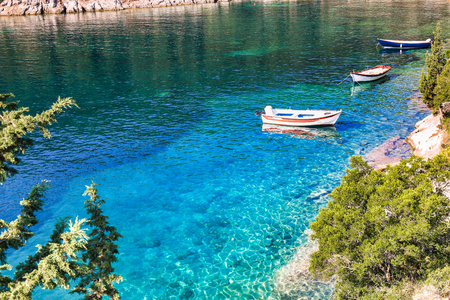 Beautiful landscape with green forest and emerald water around Foki Fiskardo beach, Kefalonia, Ionian islands, Greece.の写真素材