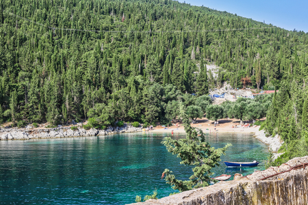 Beautiful Foki beach, located near the village of Fiskardo, is known for its emerald sea and pine forest surrounding it. Ionian island Kefalonia, Greece.の写真素材