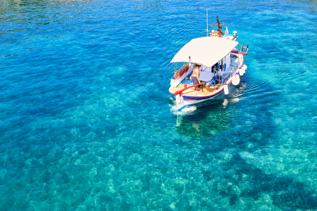 Photo taken in bay of small fishing village Fiskardo. Fiskardo is a picturesque village located on the northern most tip of Kefalonia island, Greeceの写真素材