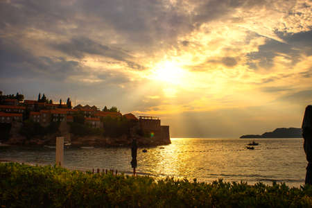 historical town island and resort at sunset. Budva riviera, Montenegro (Adriatic Sea), Europe....