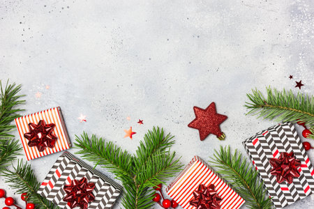 Gift boxes with red decorations on grayの写真素材