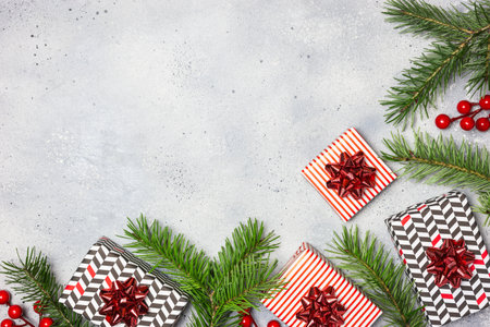 Gift boxes with red decorations on grayの写真素材