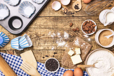 Frame of baking and cooking pastry or cake with ingredients and utensils. Flour, sugar, milk, eggs,...