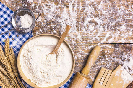 Frame of baking and cooking pastry or cake with ingredients and utensils. Flour and wheat on rustic...