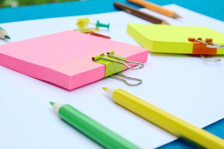Colorful Clips and note, pencil background