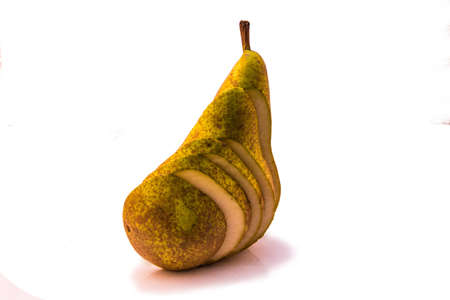 isolated pear sliced up on white の写真素材