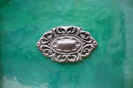 Intricate decoration on a green door in Lisbon, Portugalの写真素材