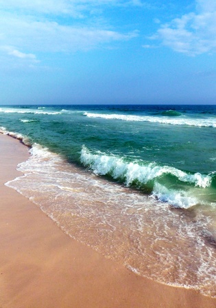 Waves hitting the shore.の写真素材
