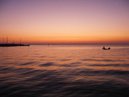 Looking out at the bay at sunset.の写真素材