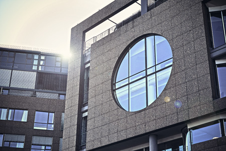 Concrete building with round windowのeditorial素材