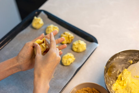Making hotteok with sugar before baking, shape dough into a ball by hands