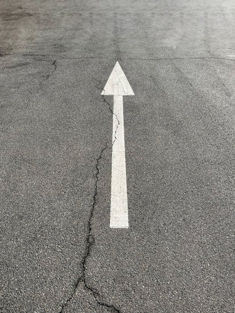 Go straight arrow on the road