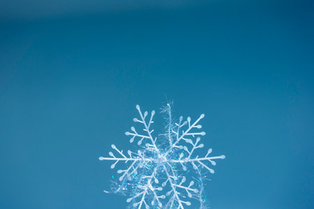 Winter snowflake with glowing threadsの写真素材