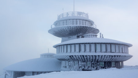 The Tadeusz Holdys High-Mountain Meteorological Observatory on Sniezka Mountain, covered with snow and ice in winter. January 2022, Sniezka, Polandのeditorial素材